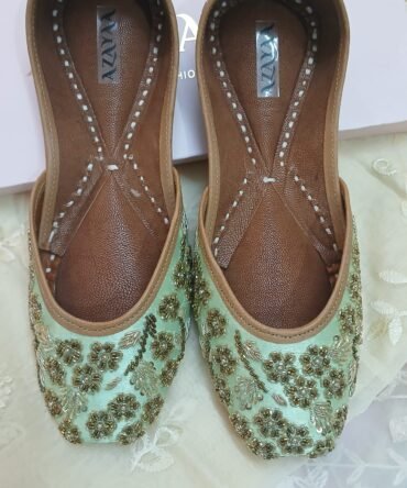 Mint satin jutti with gold zari and sequin floral embroidery