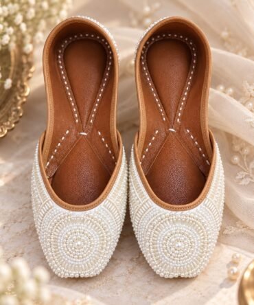 Ruhani ivory pearl handcrafted jutti by Azayaa