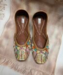 Rangrez multicolour embroidered juttis with vibrant embellishments by Azayaa