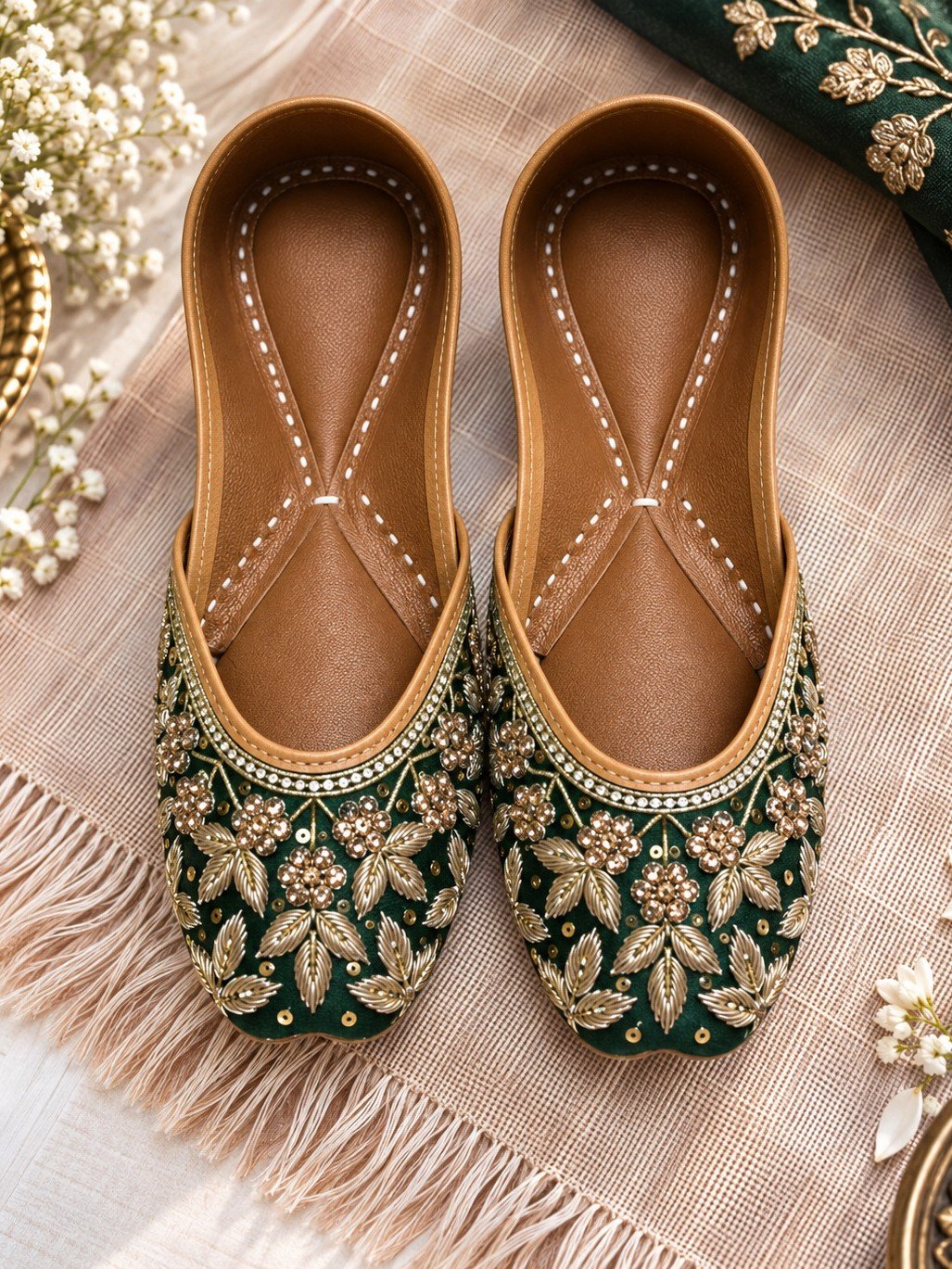 Handcrafted emerald green wedding juttis with golden embellishments