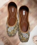Zohra gold and blue embroidered juttis with paisley detailing by Azayaa