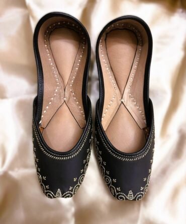 Kashish black juttis with delicate gold embroidery by Azayaa